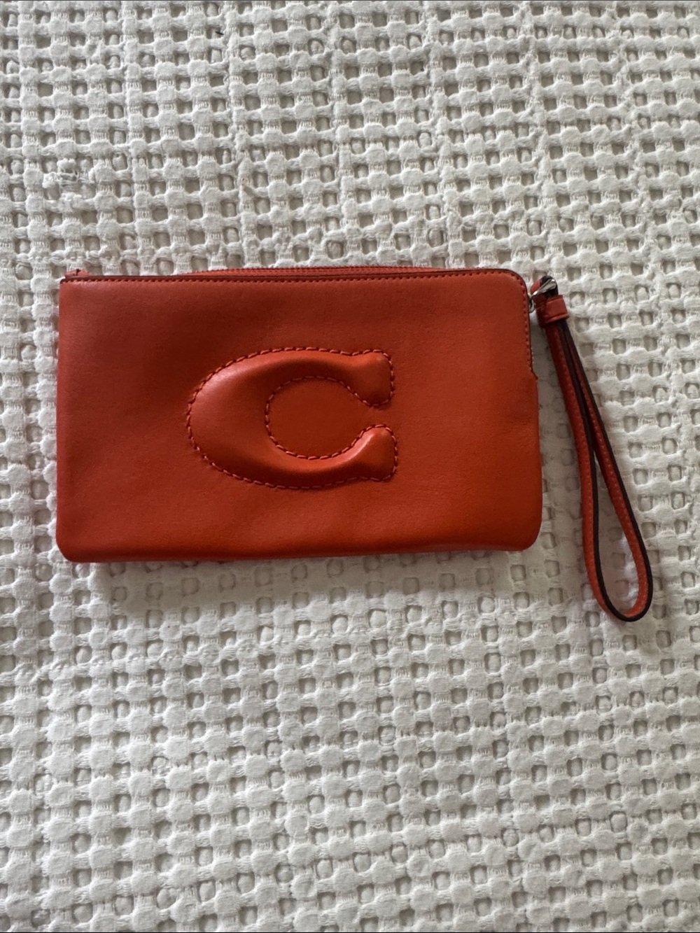 Coach Orange Leather Wristlet with Embossed C